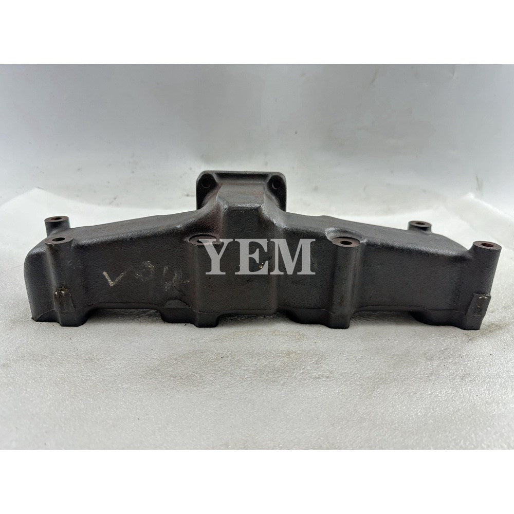 Used Exhaust Manifold For Yanmar 4TNV94 Engine Komatsu 4TNV94FHT 4TNV94HT For Yanmar